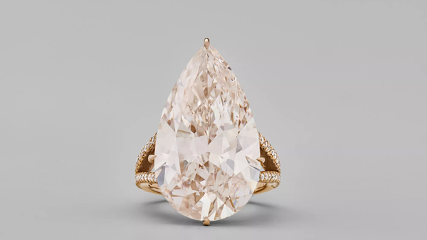 COLOURED DIAMOND AND DIAMOND RING, Light brown-pink pear modified brilliant-cut diamond of 18.72 carats, Estimate: $300,000-500,000